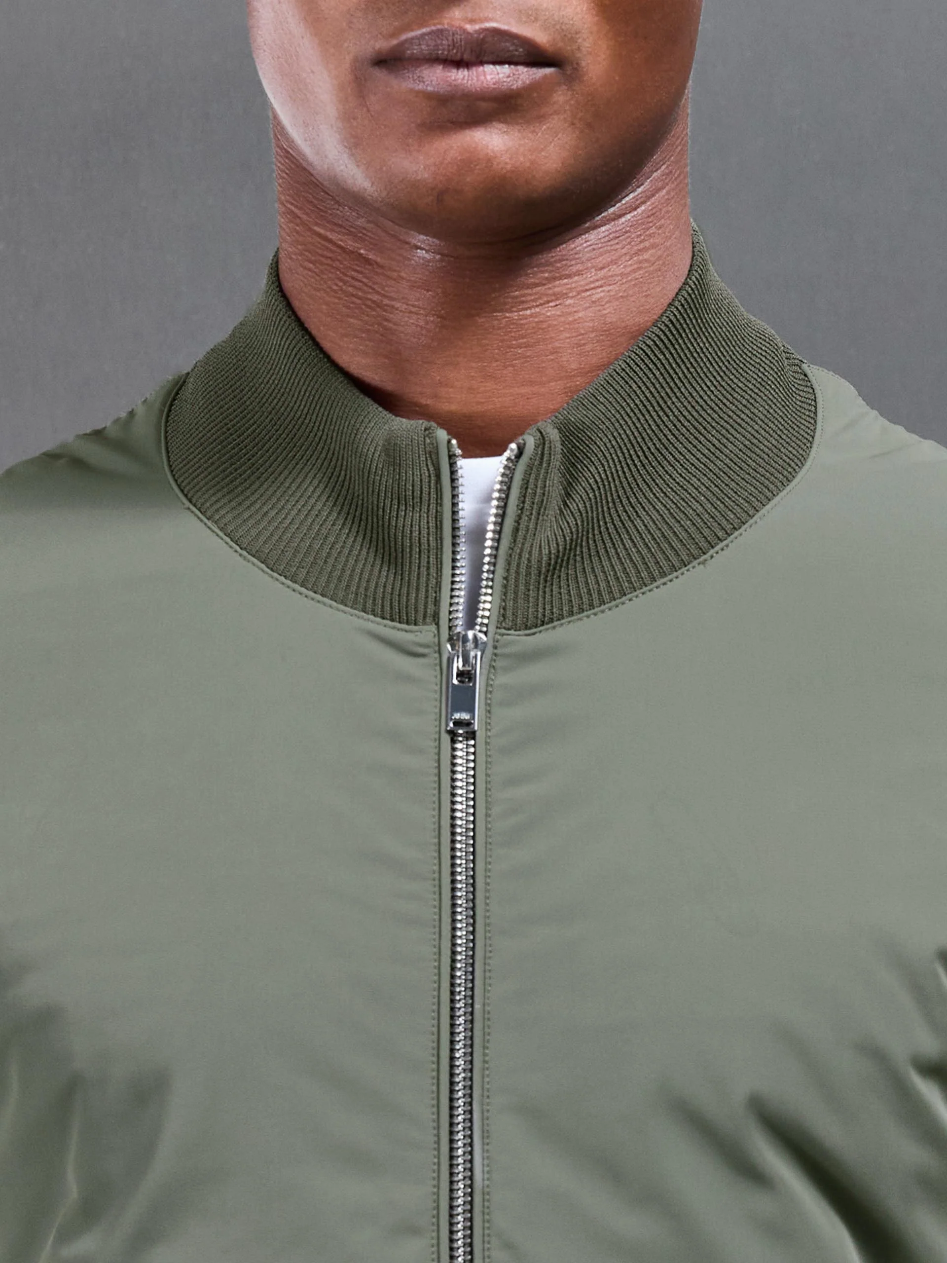 Hybrid Knitted Jacket in Olive - Image 4